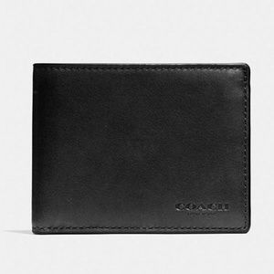 SOLD-Brand New Coach Black Embossed Leather wallet